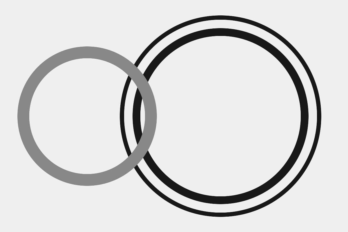 Abstract grayscale composition of two overlapping rings.